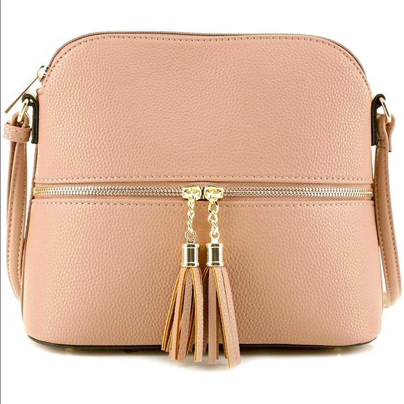SUGU Handbags - NWT SUGU medium rose gold crossbody bag